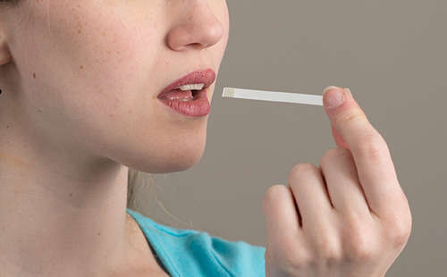 A saliva swab is one of the methods used to detect alcohol intake image photo picture
