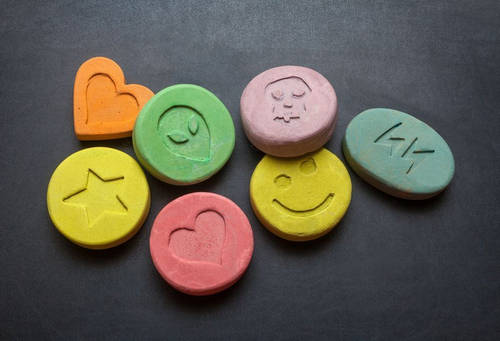 Colorful tablets, which looks like candy but are actually ecstasy image photo picture